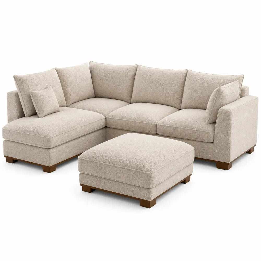 Narożna sofa z podnóżkiem tapicerowana beżowa z drewnianymi nóżkami